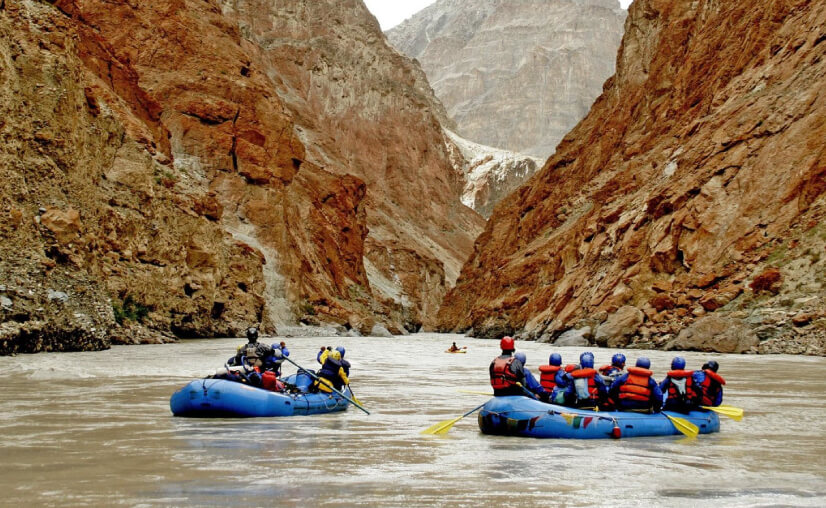 River rafting in Ladakh. High altitude rafting. Rafting among mountains.