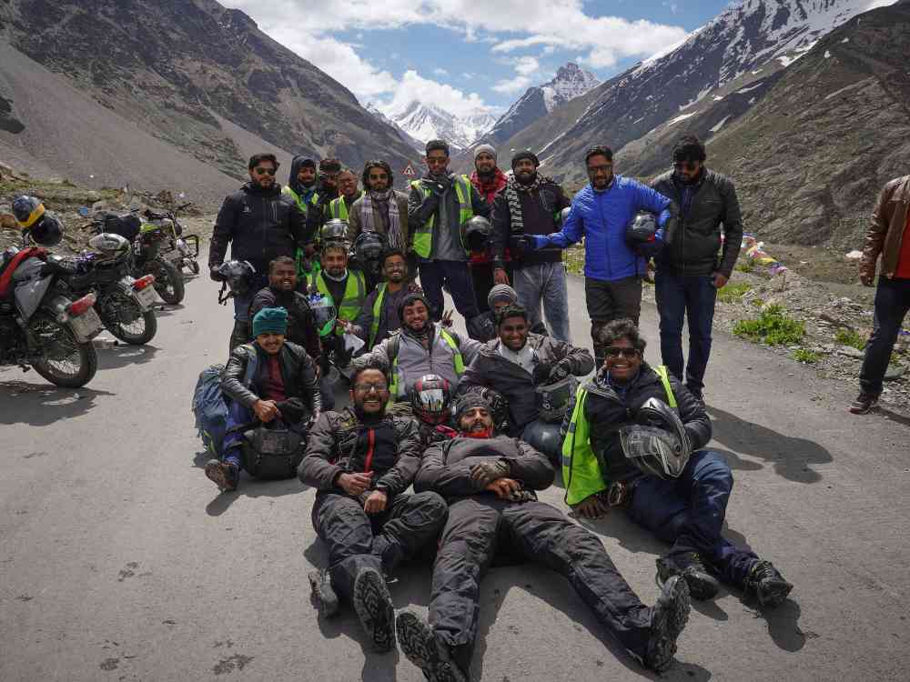 Ladakh bike trip group posing together.