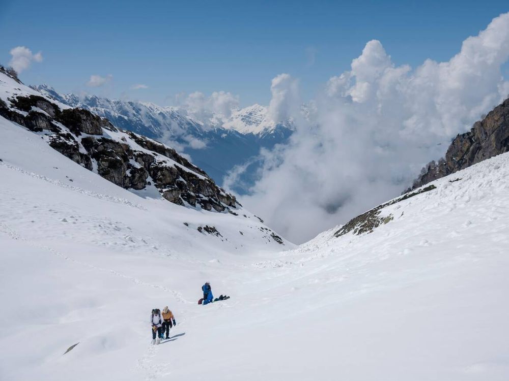 Trekkers in snowy mountain in Pahalgam in Winter season