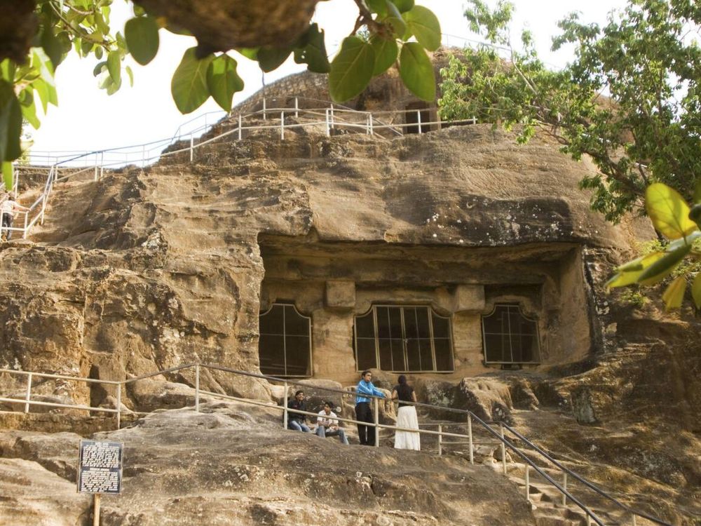 Group of Tourists strolling around Pandava Caves, Pachmarhi, Madhya Pradesh