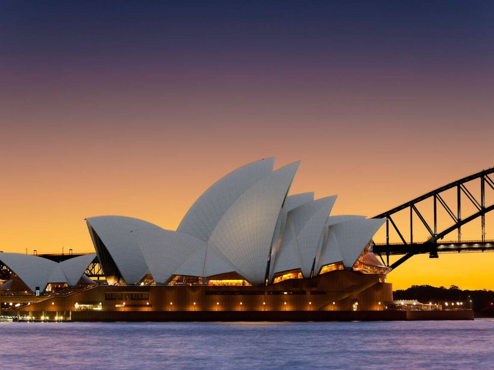 Sydney Opera House with Sydney Harbor Bridge, Australia