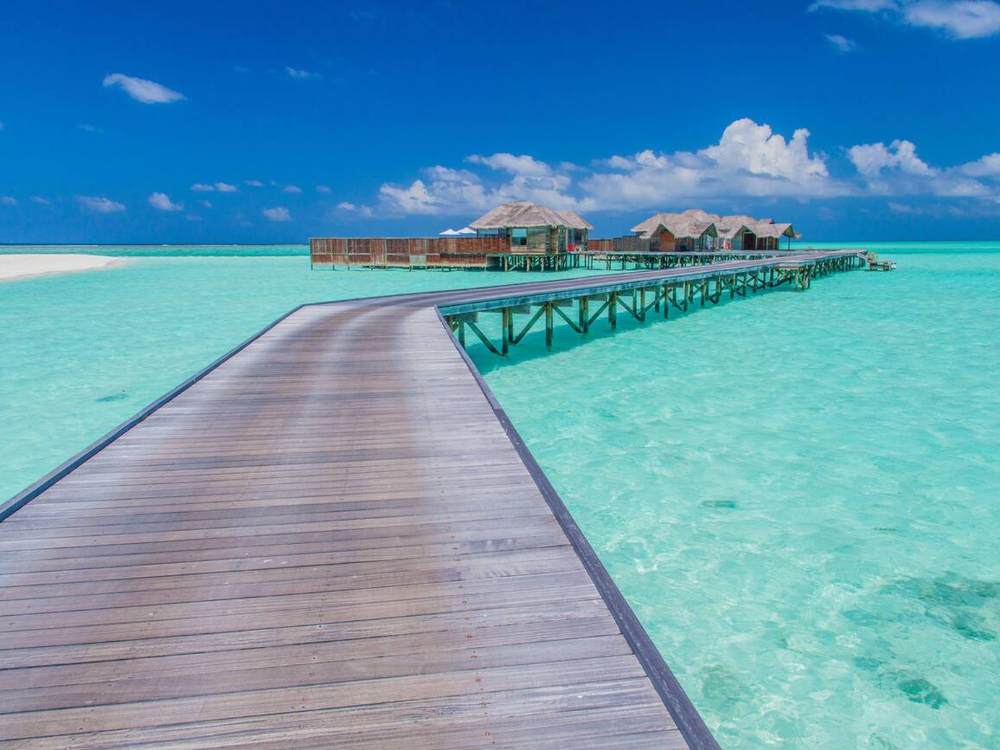View of overwater bungalows at a resort in the Maldives