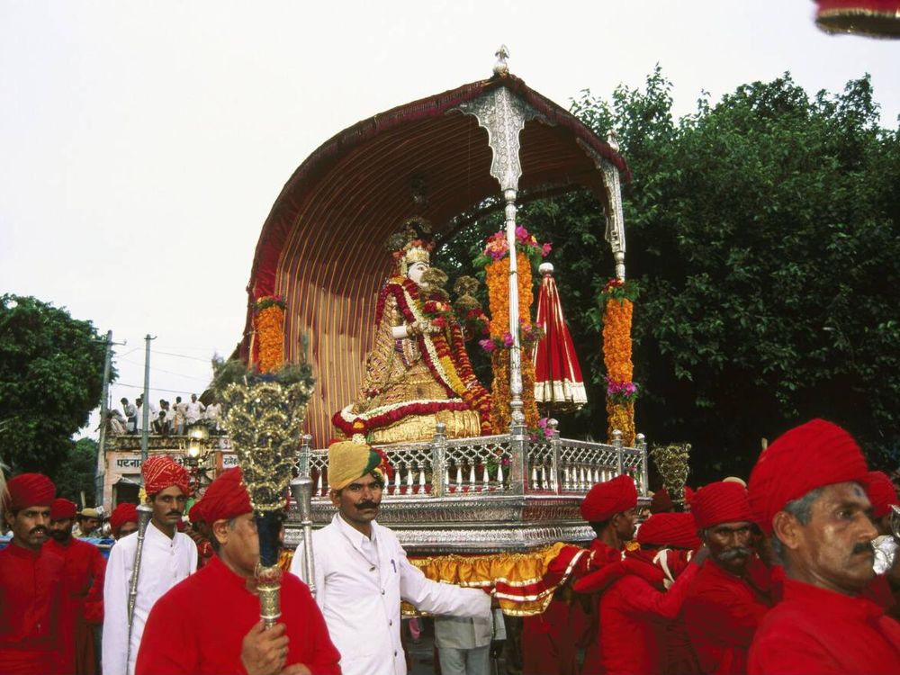 Teej festival, idol of goddess parvati in palanquins, jaipur, rajasthan, india