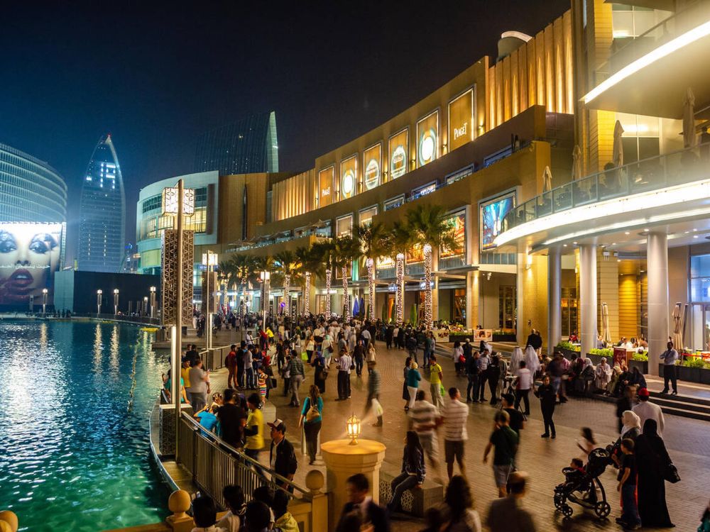 Tourists and visitors walking outside the Mall of Dubai