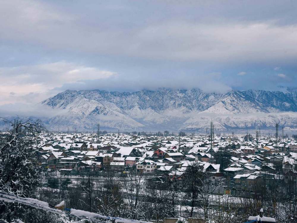 A general view of Srinagar City after a first spell of Snowfall