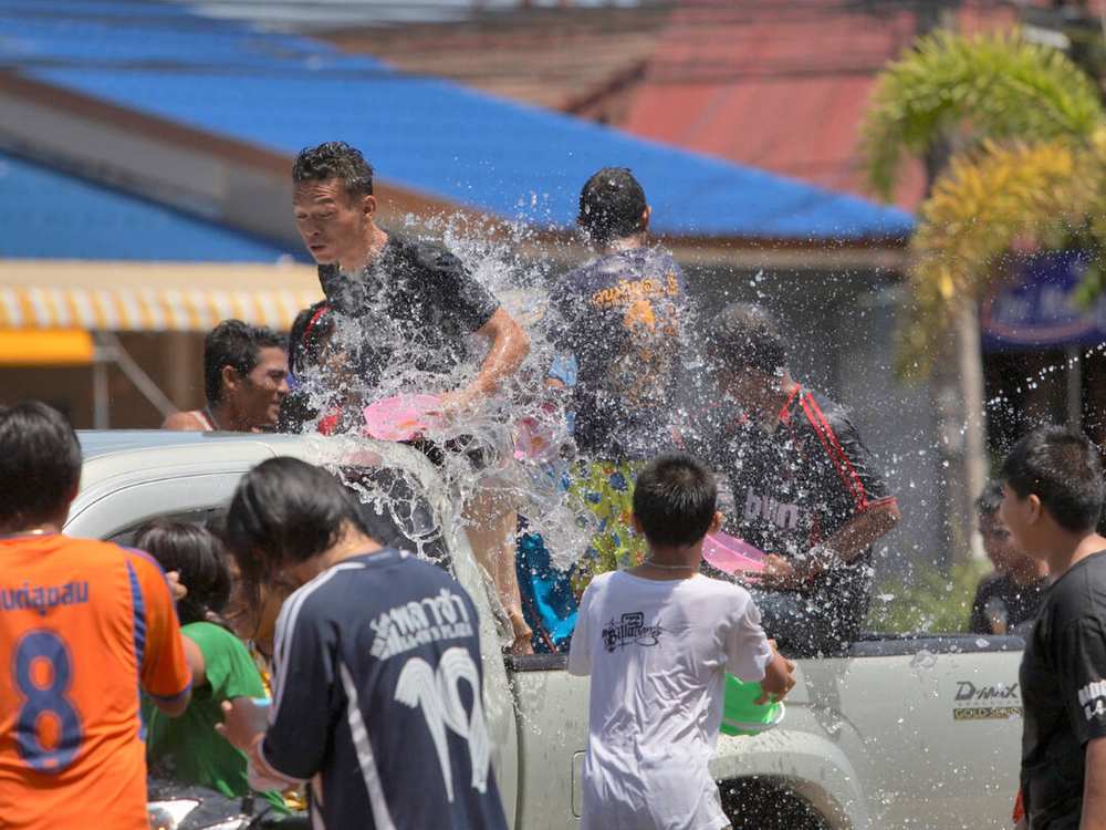 People enjoying songkran celebration in Thailand