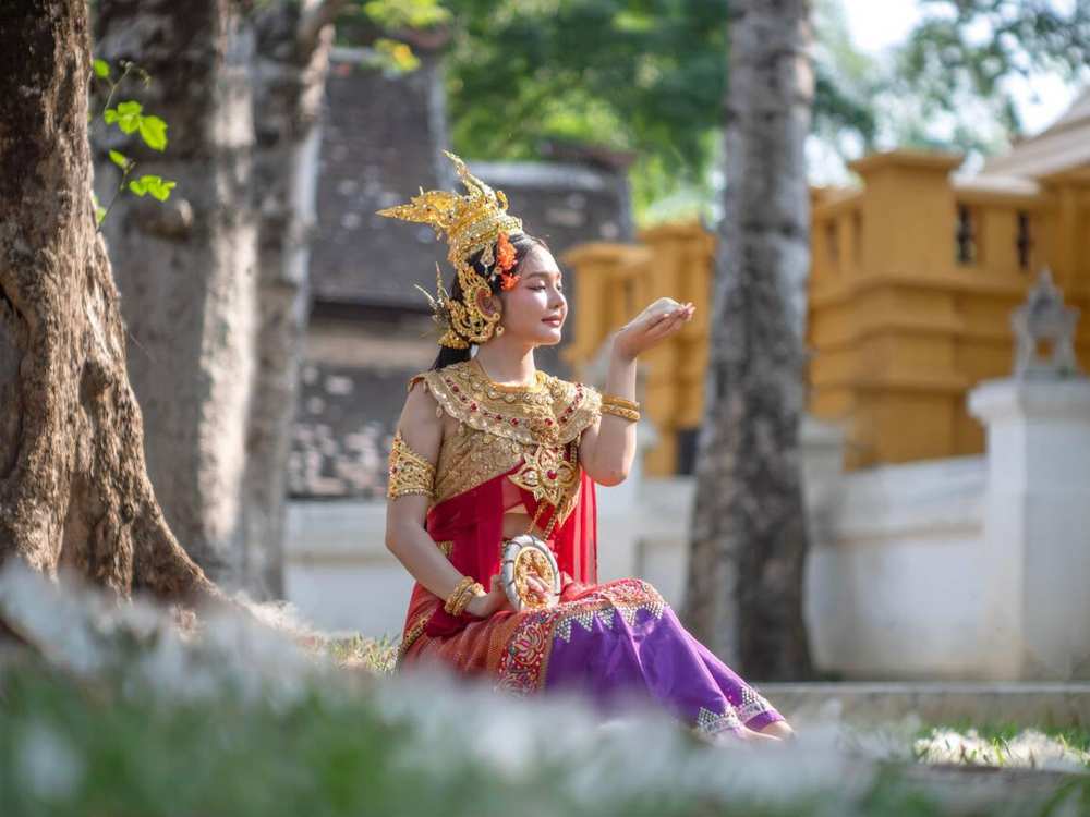 Woman dressed in traditional costume for songkran festival