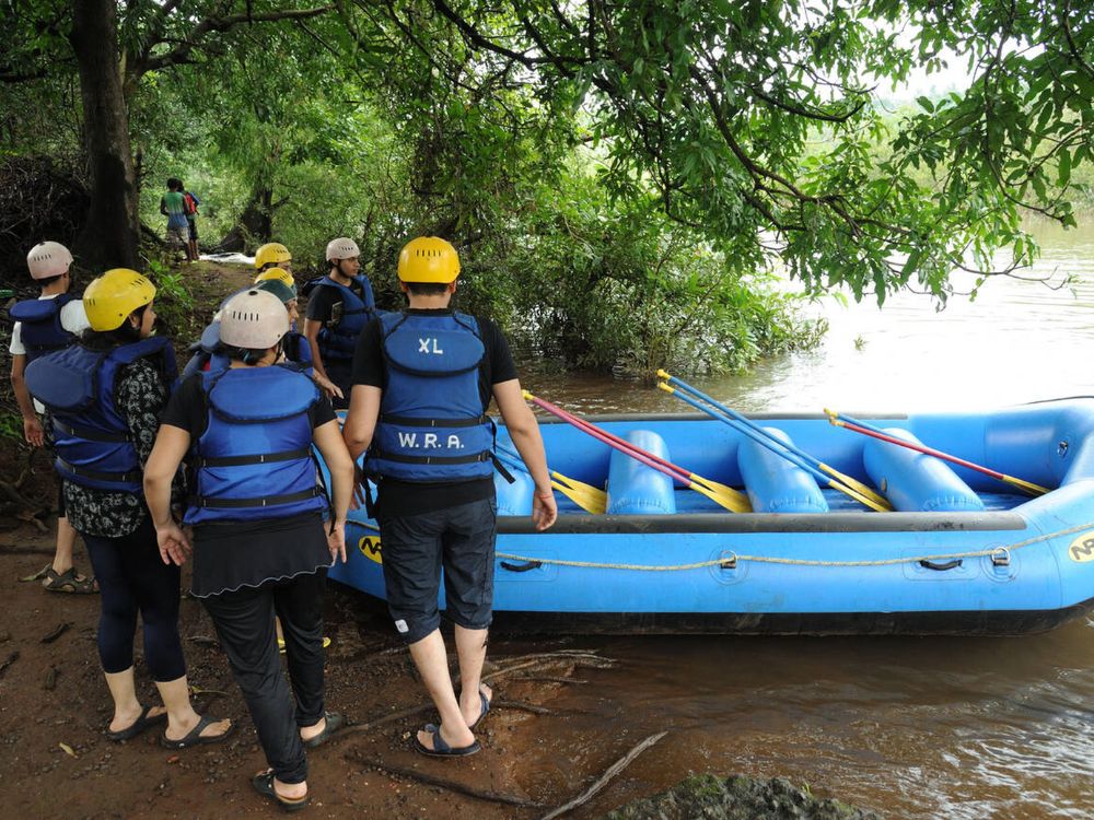 Group of travelers near a raft in kolad, Maharashtra
