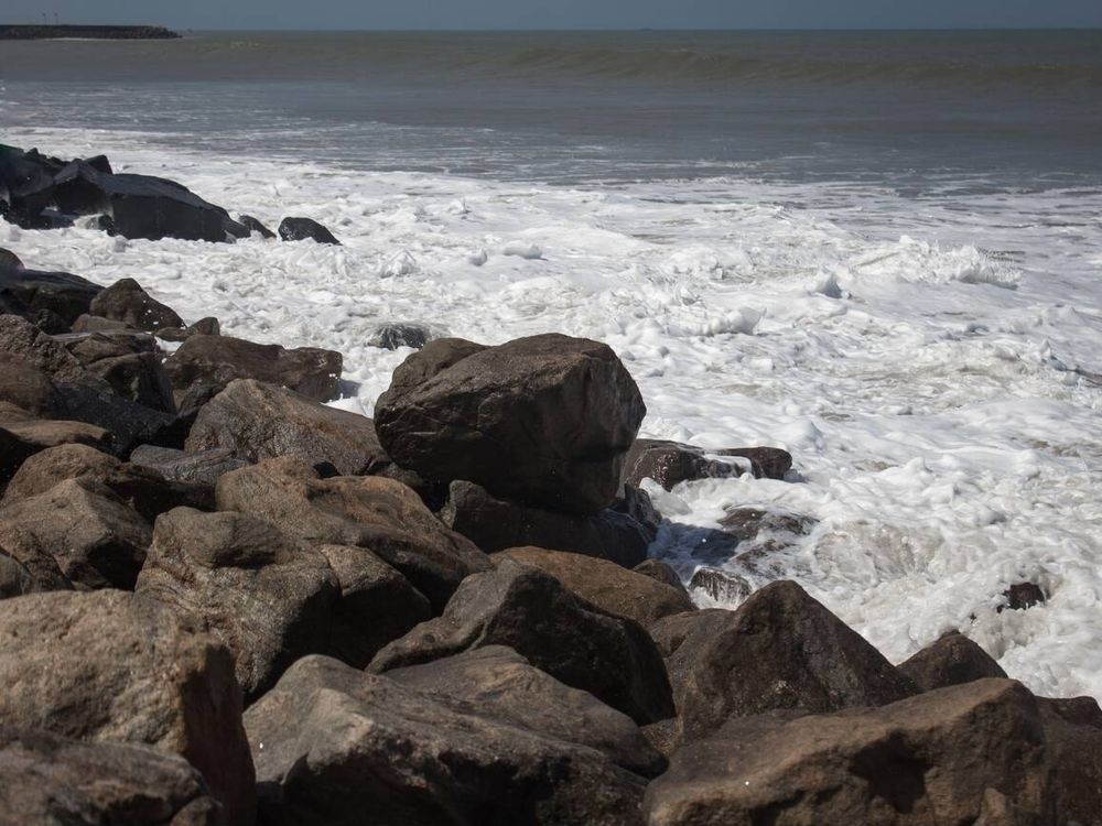 Large rock formations near Poompuhar Beach in Tamil Nadu.