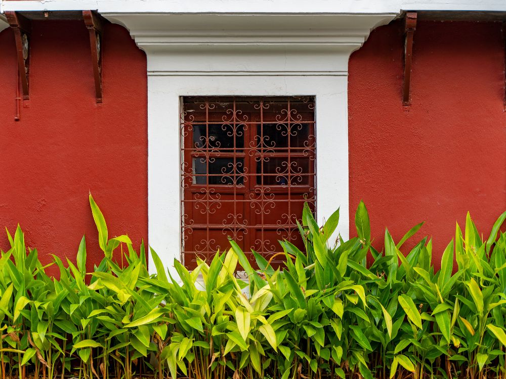 Red-painted colonial house in Fontainhas, the Latin Quarter of Panaji, Goa.